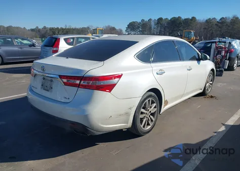 2013 Toyota Avalon Xle z USA, uszkodzony, nr VIN 4T1BK1EB4DU039140